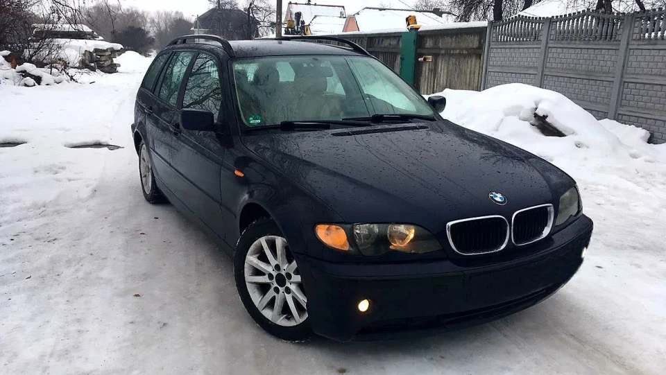 BMW 3 series Touring 320D Муха