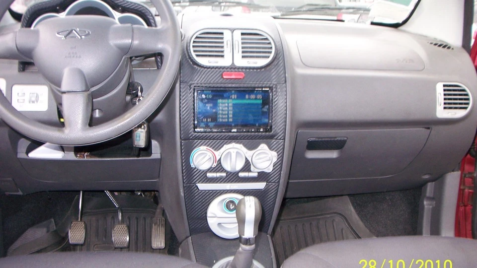 Chery Kimo бордовая рукавичка 5