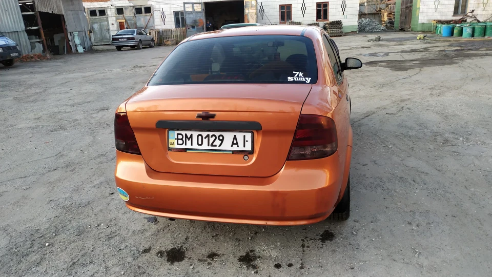 Chevrolet Aveo Sedan Пекучий апельсин 2