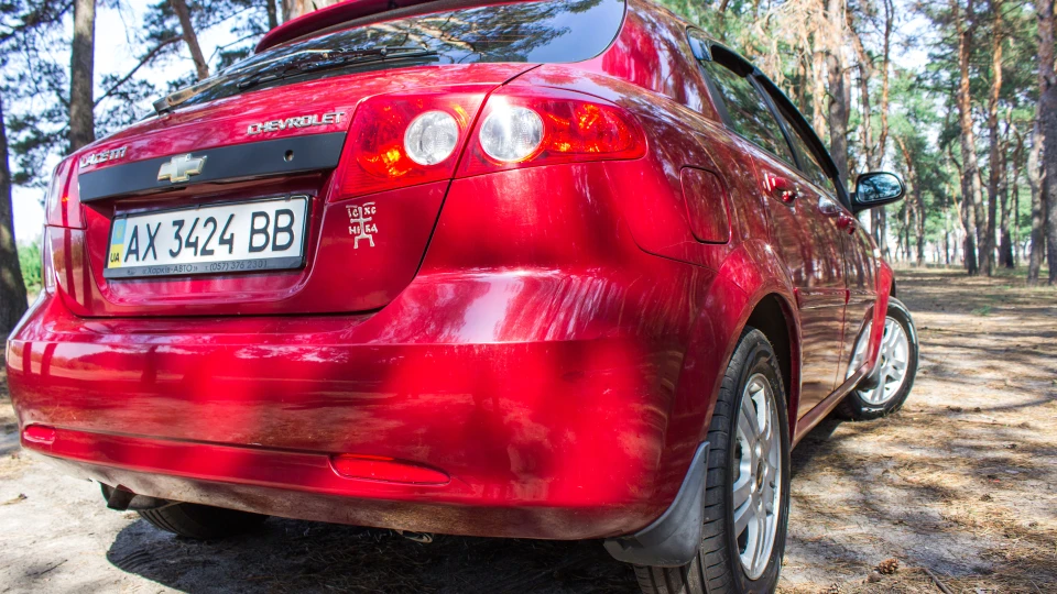 Chevrolet Lacetti 5D Червоний дрішпалет