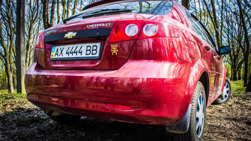Chevrolet Lacetti 5D Червоний дрішпалет 3