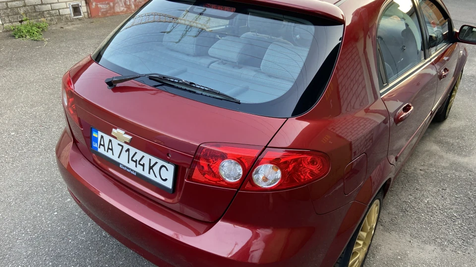Chevrolet Lacetti 5D Червоний металік 3