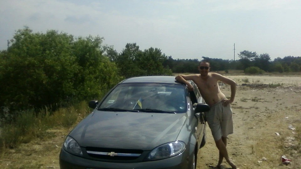 Chevrolet Lacetti 5D Сірий металік 1.6 SE 4