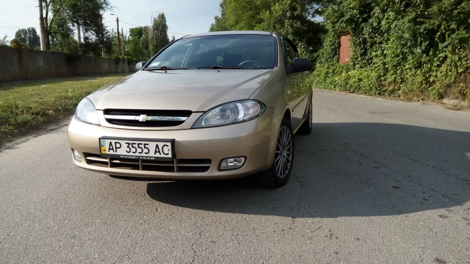 Chevrolet Lacetti 5D Золотий металік 1.6 3