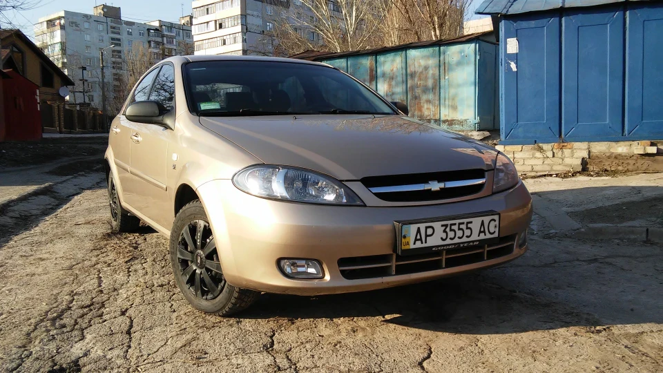 Chevrolet Lacetti 5D Золотий металік 1.6 4