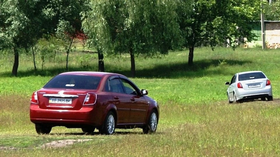 Chevrolet Lacetti червоний металік SX 2