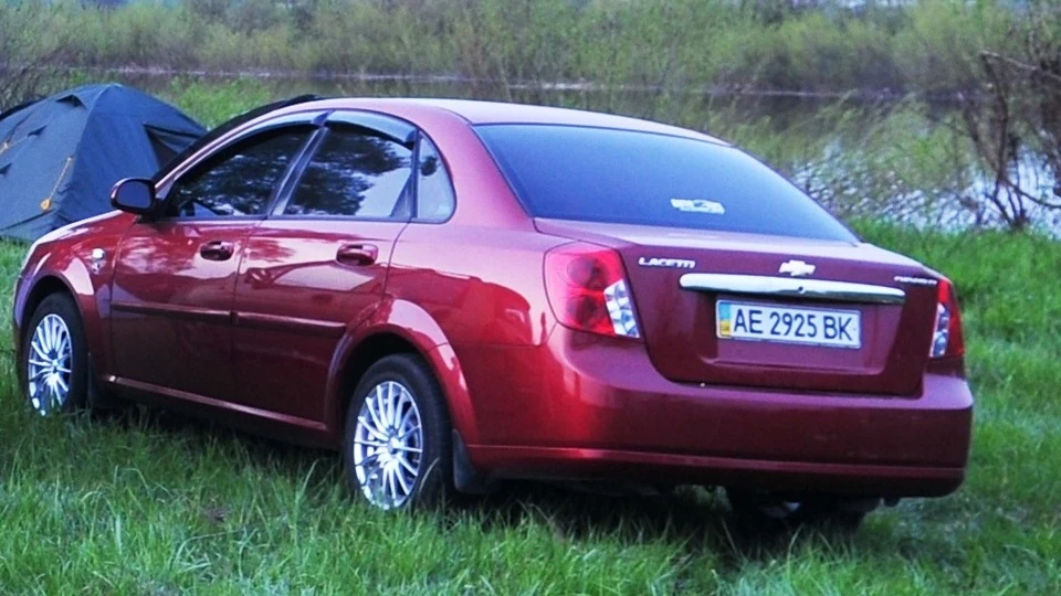Chevrolet Lacetti червоний металік SX 4