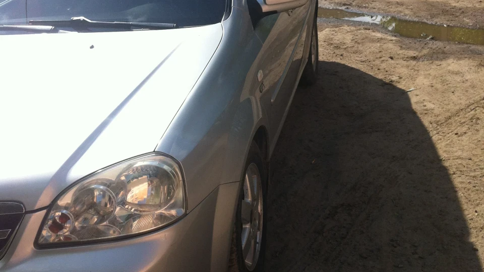 Chevrolet Lacetti сріблястий металік 1.8 3
