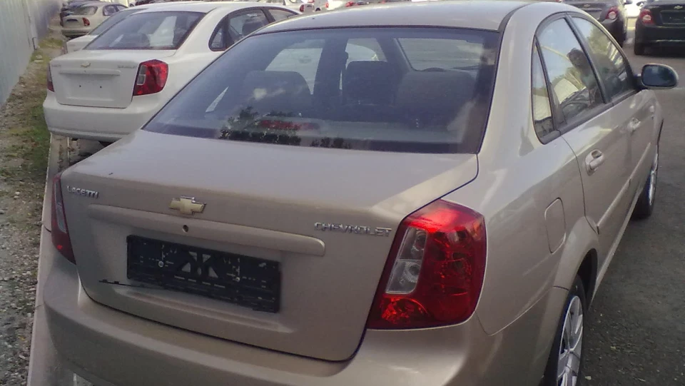 Chevrolet Lacetti Золотий металік SX 1.8