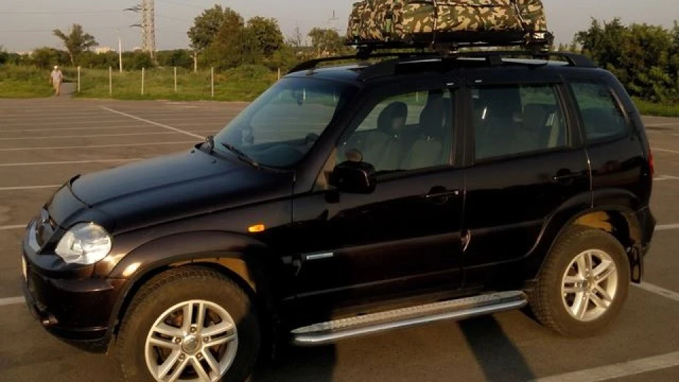 Chevrolet Niva Бігімот колір Дика слива