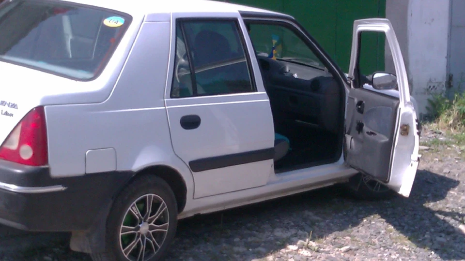 Dacia Solenza ) 4
