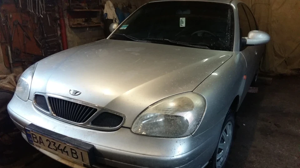 Daewoo Nubira Сріблястий металік 1.6 5