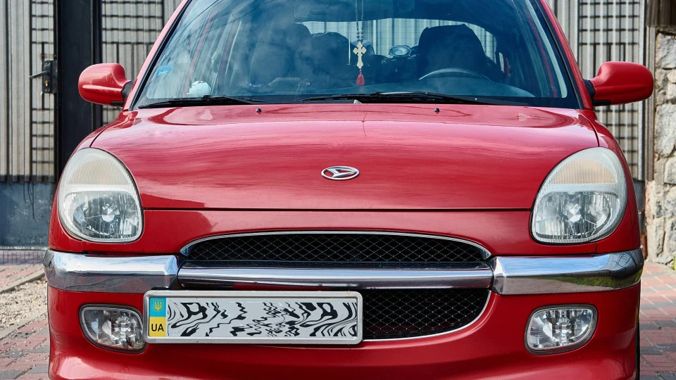 Daihatsu Sirion Pure red 4x4 2