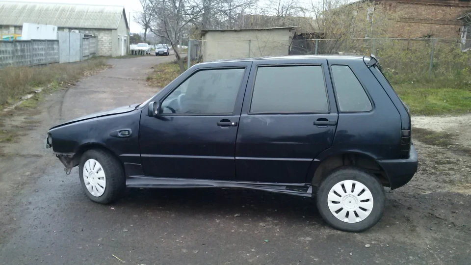 FIAT Uno 1.5))) 2