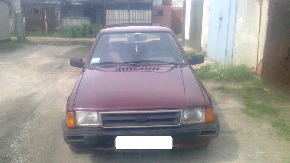 Ford Escort вишневий перламутр