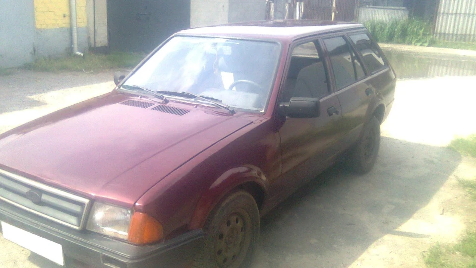 Ford Escort вишневий перламутр 4