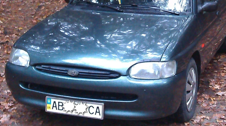 Ford Escort зелений металік