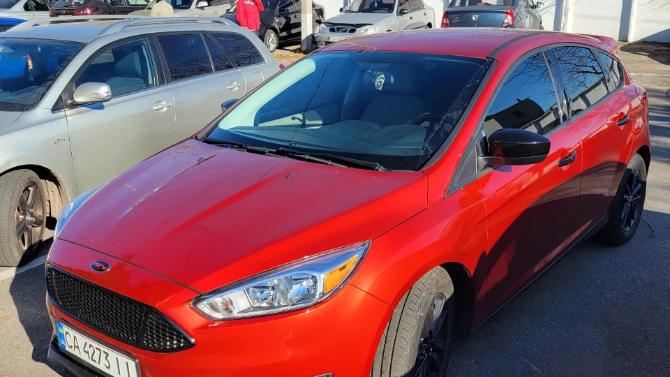 Ford Focus Hatchback Помаранчевий 2.0GDI, SE 2
