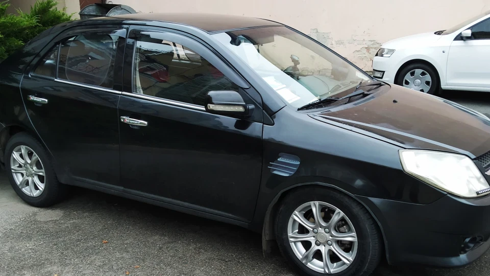 Geely MK чорна перлина