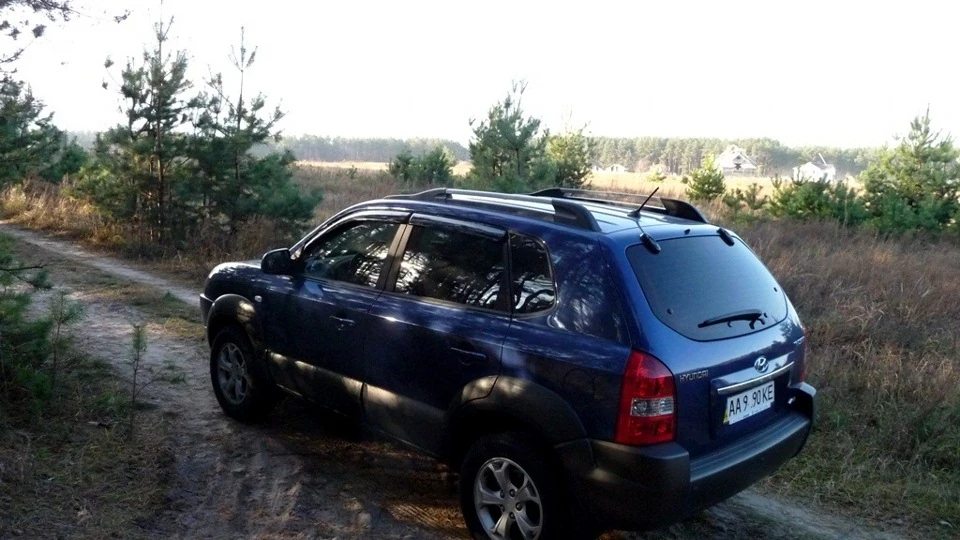 Hyundai Tucson синій 2.0 бензин/газ 4WD 2