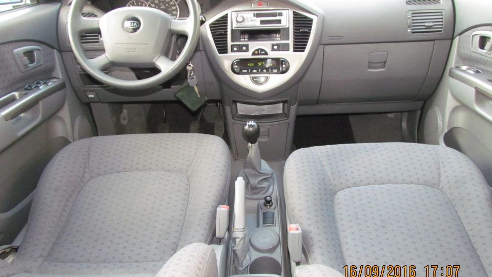 KIA Carens 2.0 турбо 2