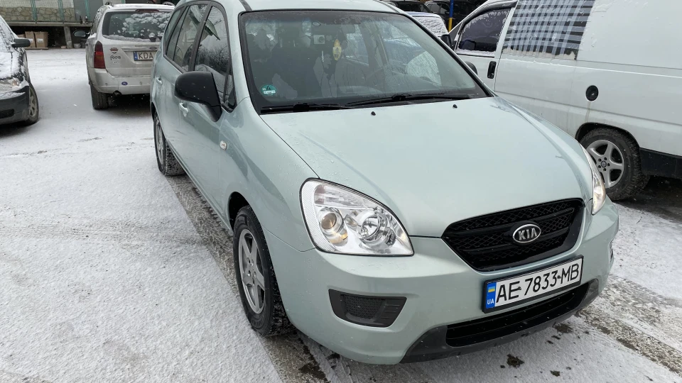 KIA Carens Школяр