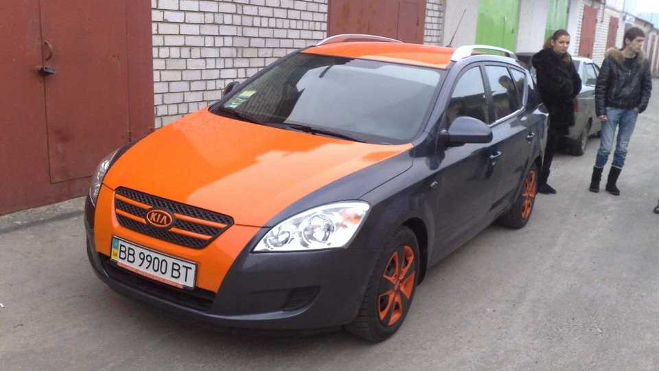 KIA Ceed SW Помаранчевий лінивець 3