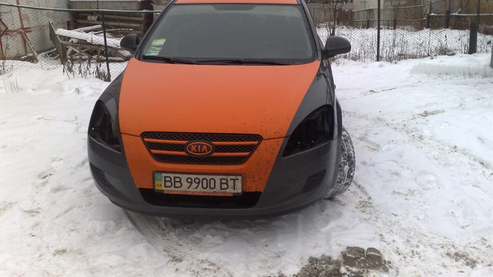 KIA Ceed SW Помаранчевий лінивець 5