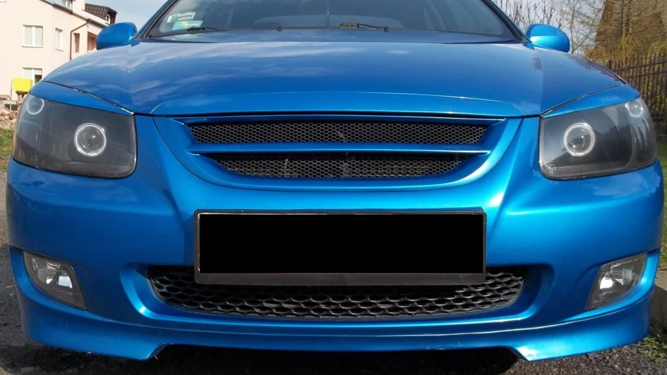 KIA Cerato blue and some black 5
