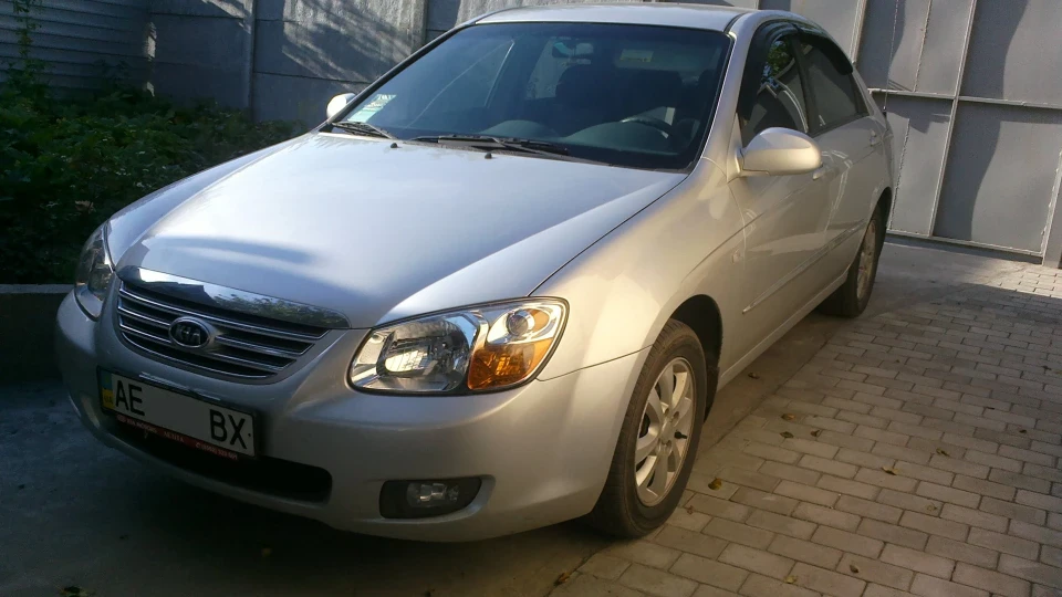 KIA Cerato Срібляста, 1.6, хутро.