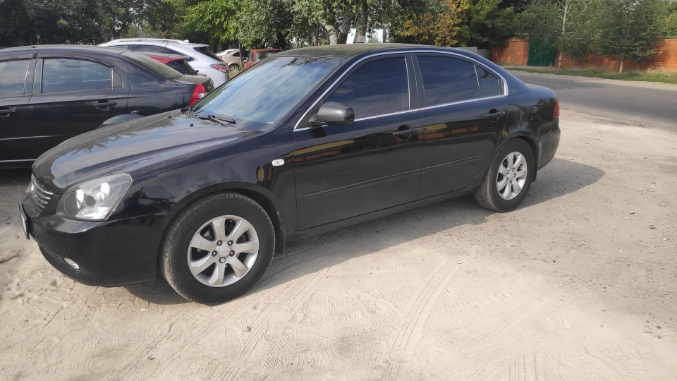 KIA Magentis Задоволений як слон)