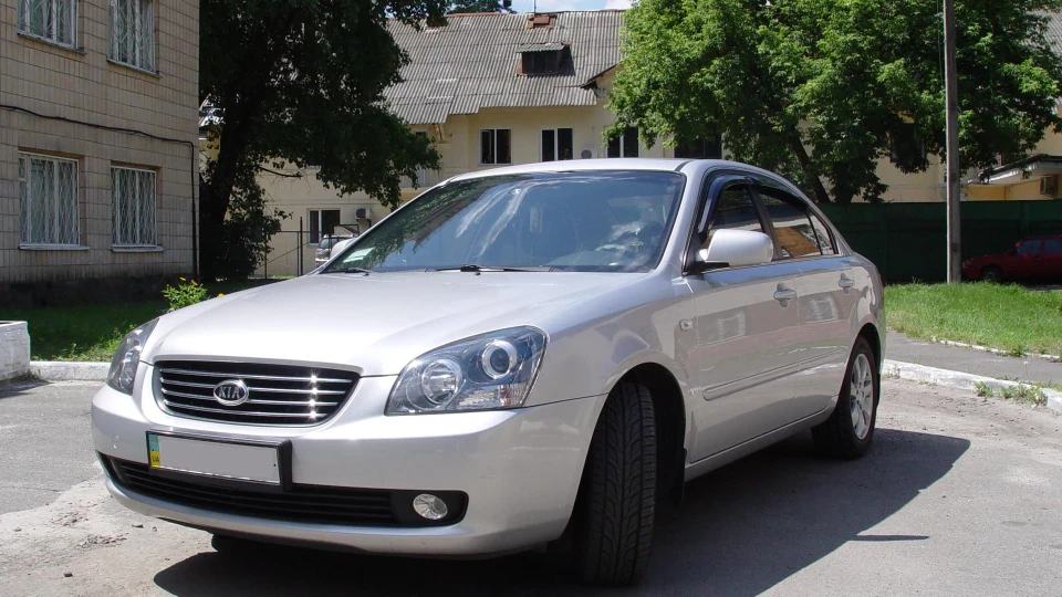 KIA Magentis Сірий вовчок