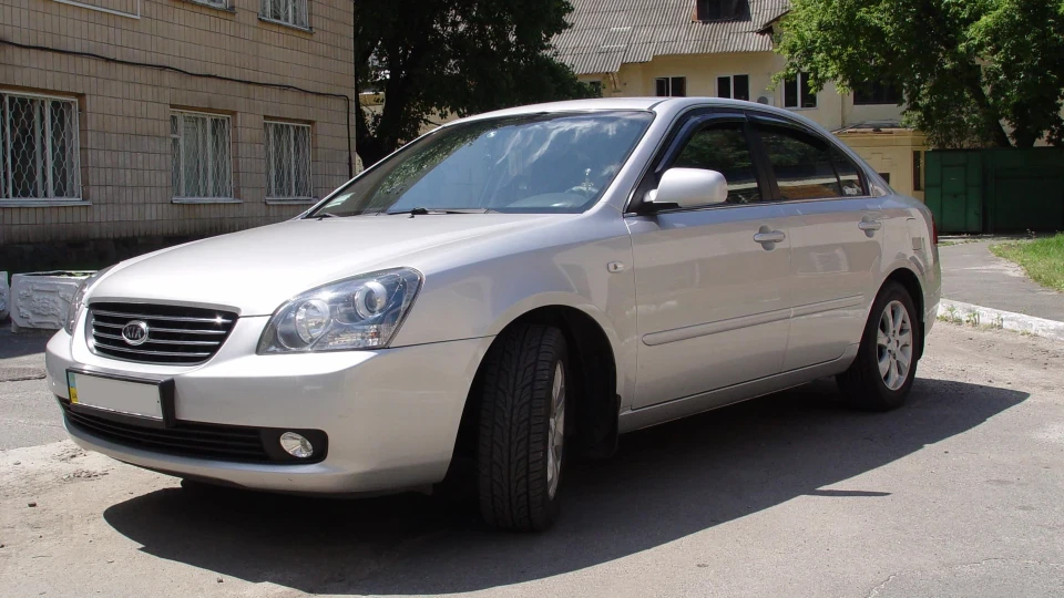 KIA Magentis Сірий вовчок 4