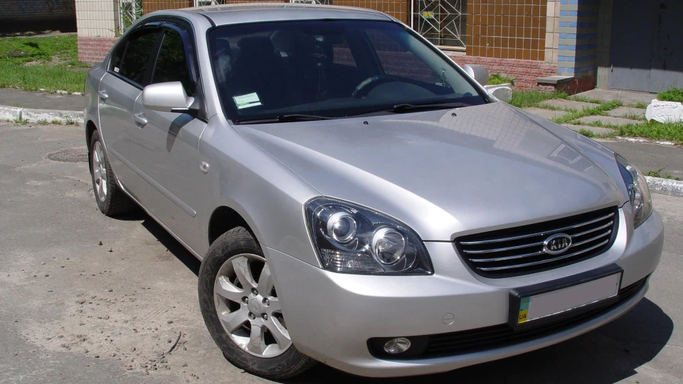 KIA Magentis Сірий вовчок 5