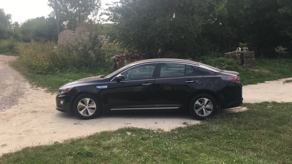 KIA Optima Hybrid Троллейбус 2