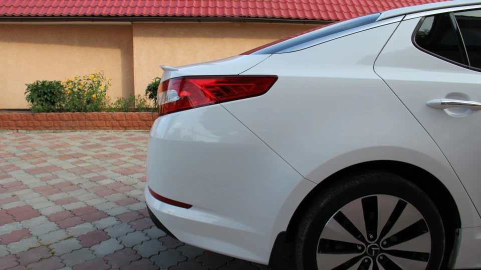 KIA Optima БІЛОСНІЖКА 4