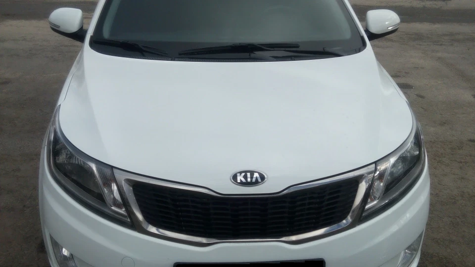 KIA Rio білий комірець) 2