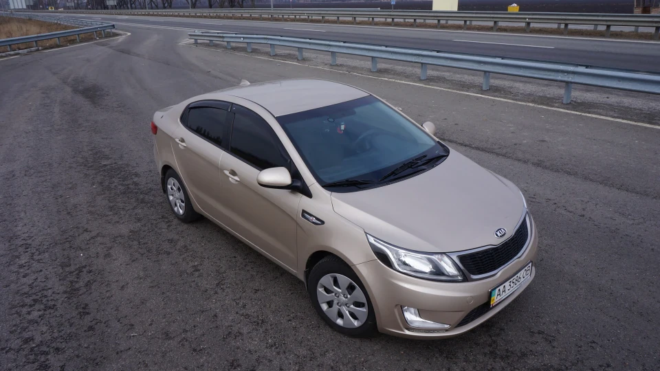 KIA Rio Gold Car 5
