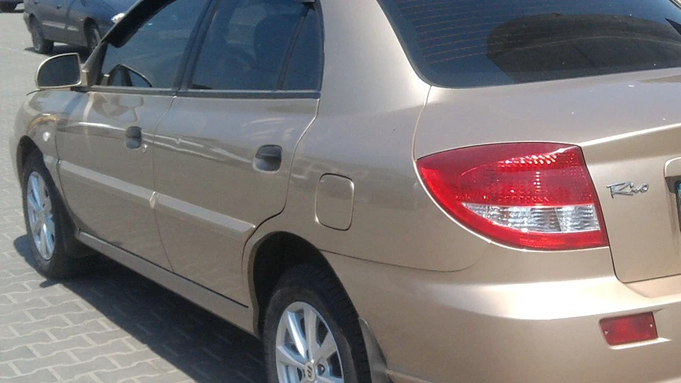 KIA Rio RS золотистий металік