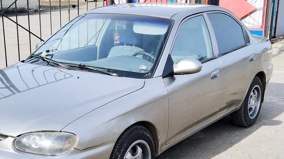 KIA Sephia Бежевий 3