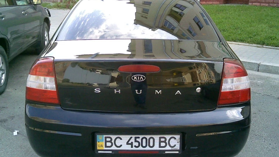KIA Shuma Чорний перламутр 2