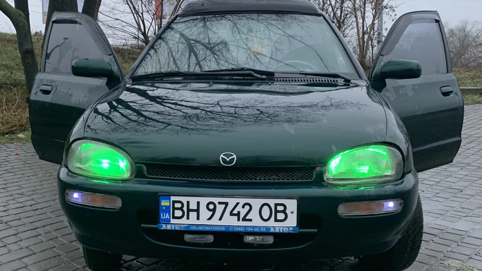 Mazda 121 (Хазбік) Кабріолет 2