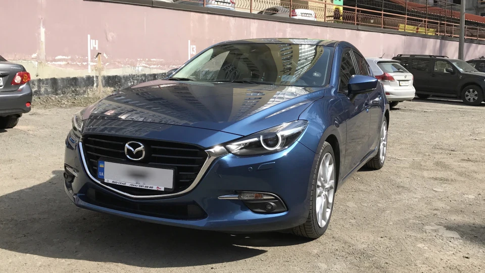 Mazda 3 Exclusive 4