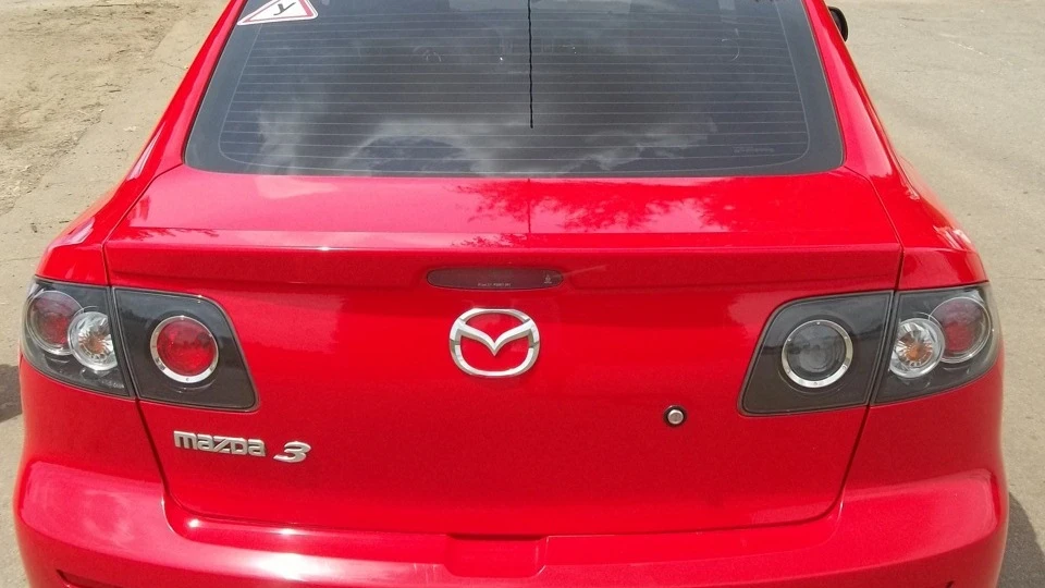 Mazda 3 матрьошка в червоному 4