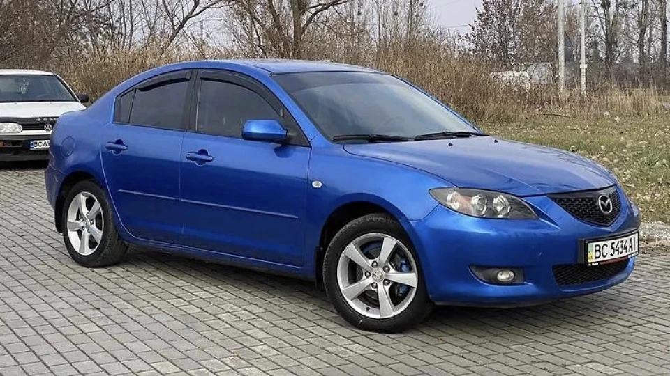 Mazda 3 Вжик