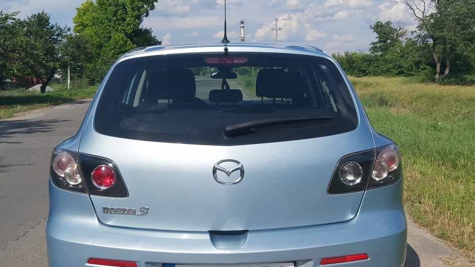 Mazda 3 ХХХ 2