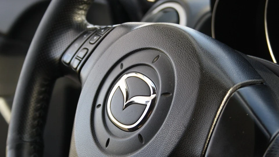 Mazda 3 Yголек 4