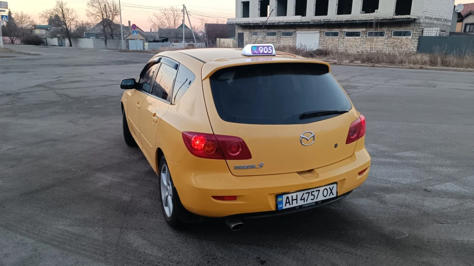 Mazda 3 Жовта улитка 2