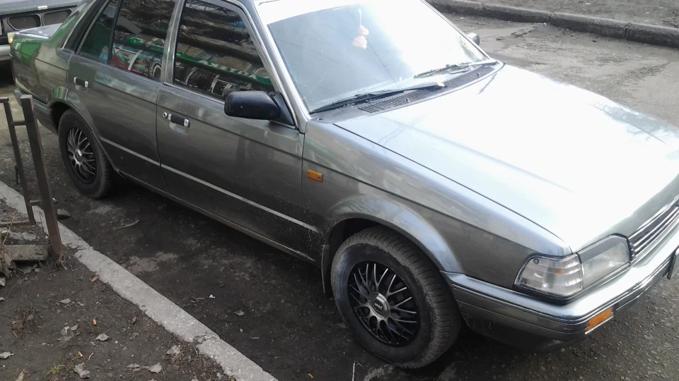 Mazda 323 ))) 2