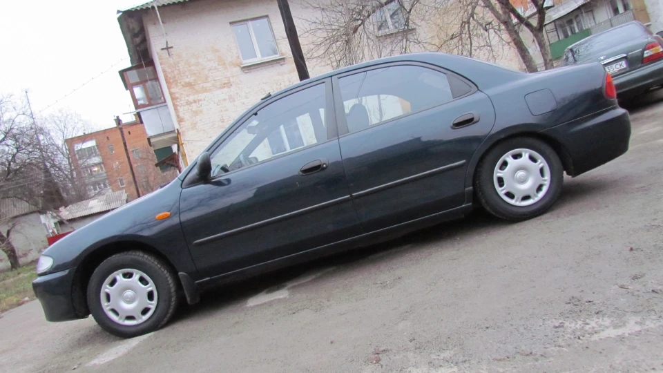 Mazda 323 1.5 BeStiyA 3